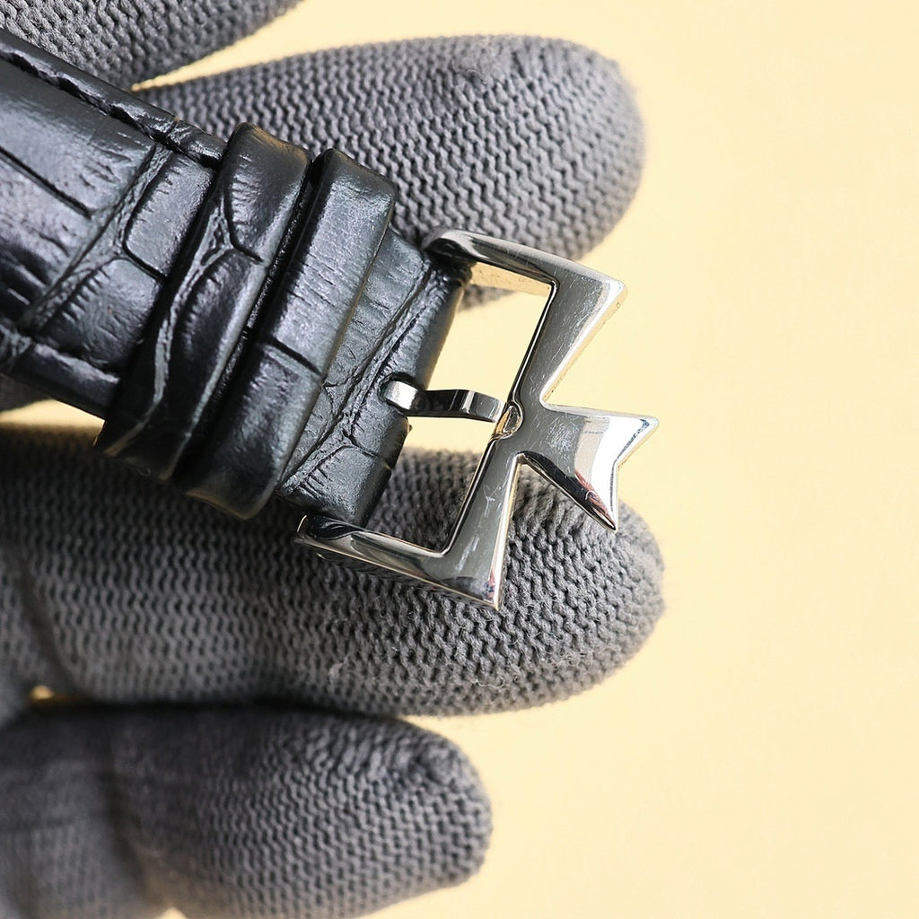 Vacheron Constantin watch clasp on black leather strap with polished metal buckle