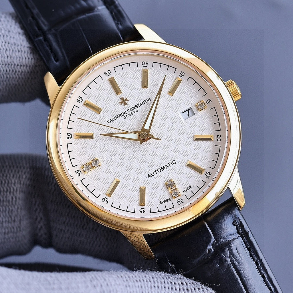 Vacheron Constantin watch with gold-tone case, white textured dial, black leather strap