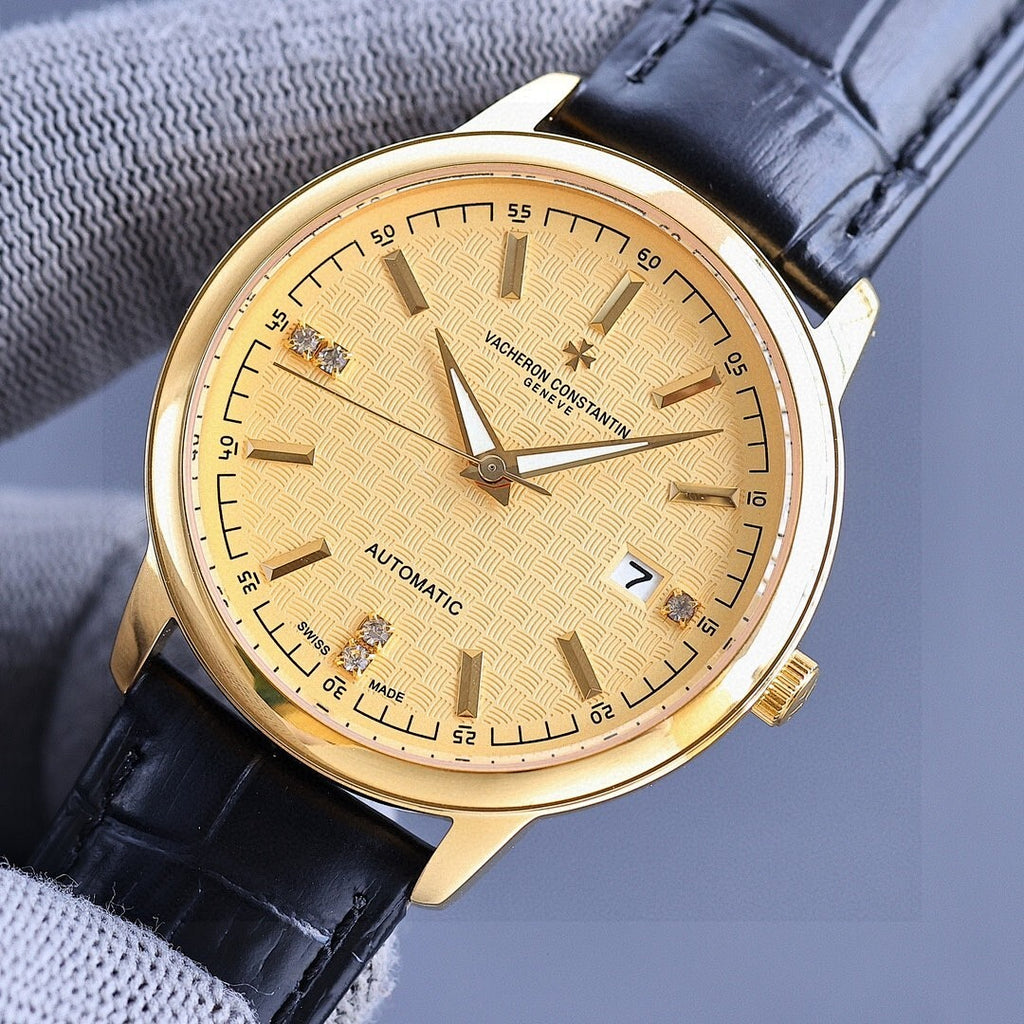 Vacheron Constantin watch with gold-tone case, light tan dial, black leather leather strap