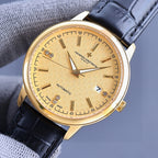 Vacheron Constantin watch with gold-tone case, light tan dial, black leather leather strap