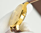 Vacheron Constantin watch back view with gold case and brown leather strap
