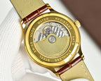 Vacheron Constantin watch open caseback showing mechanical movement, gold rim, brown leather strap
