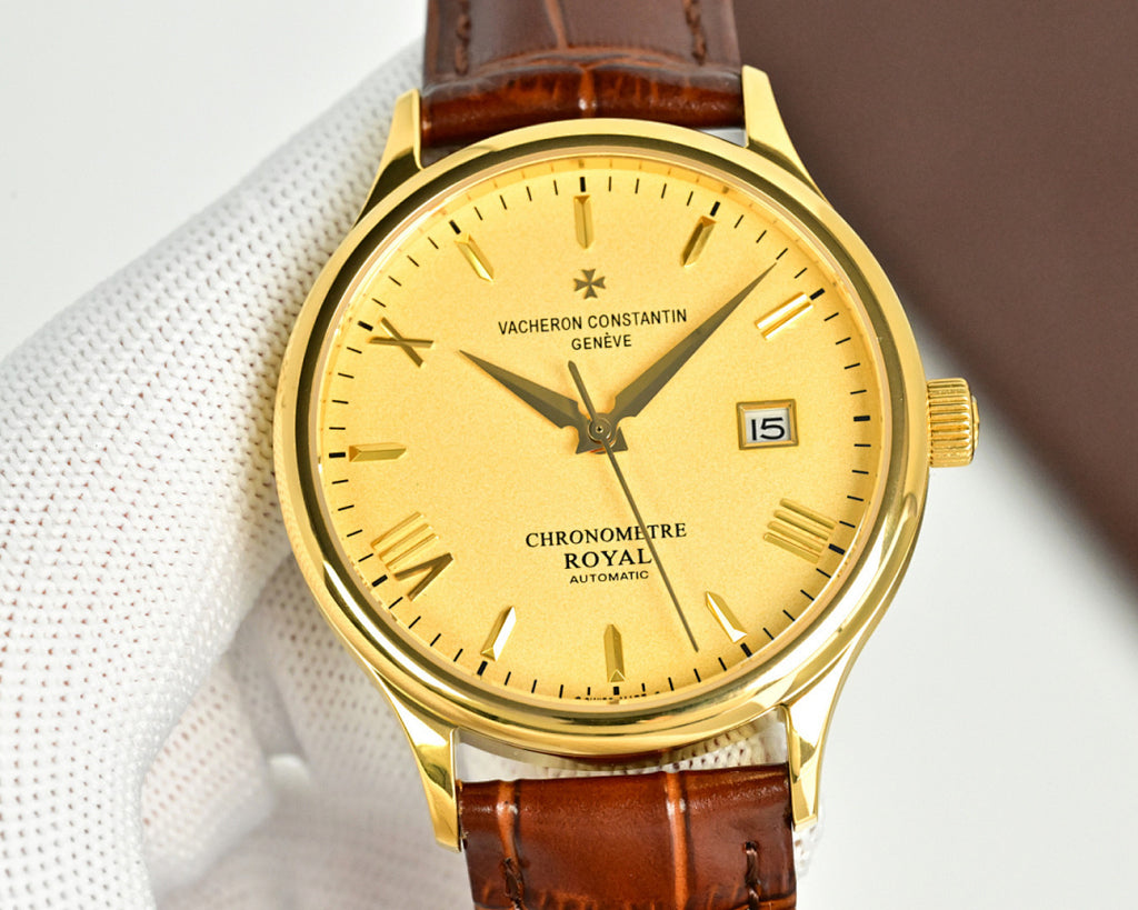 Vacheron Constantin watch with gold case, yellow dial, brown leather strap and date window