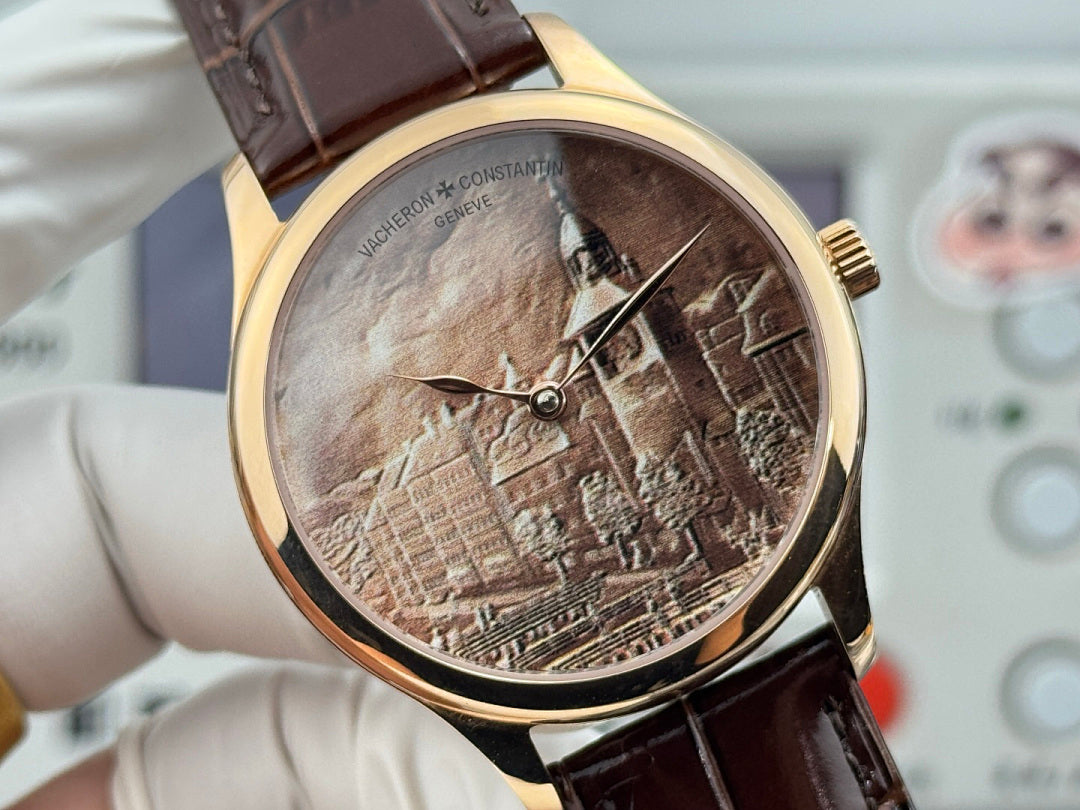 Gold-tone wristwatch with brown leather strap; close view of sepia city dial and hands