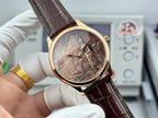 Gold-tone wristwatch with brown leather strap; side angle shows sepia city dial with Eiffel Tower