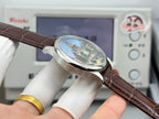Vacheron Constantin wristwatch with brown leather strap and tower city dial