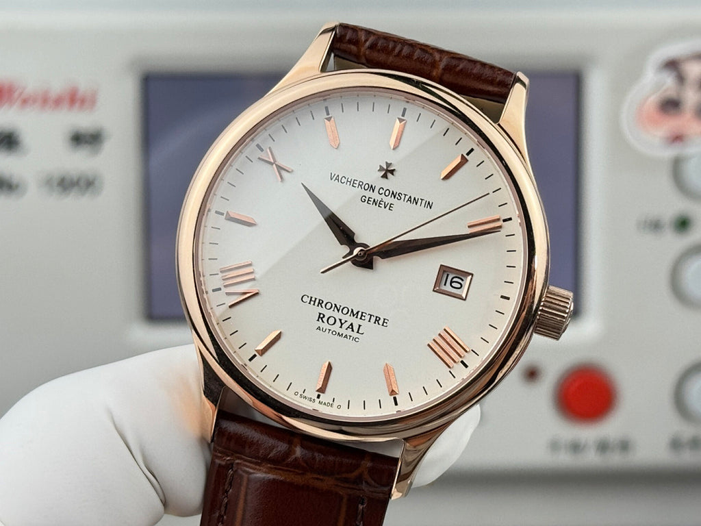 Vacheron Constantin wristwatch front view with white dial, brown leather strap, date window