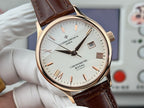 Vacheron Constantin wristwatch close-up with white dial, brown leather strap, gold-tone bezel