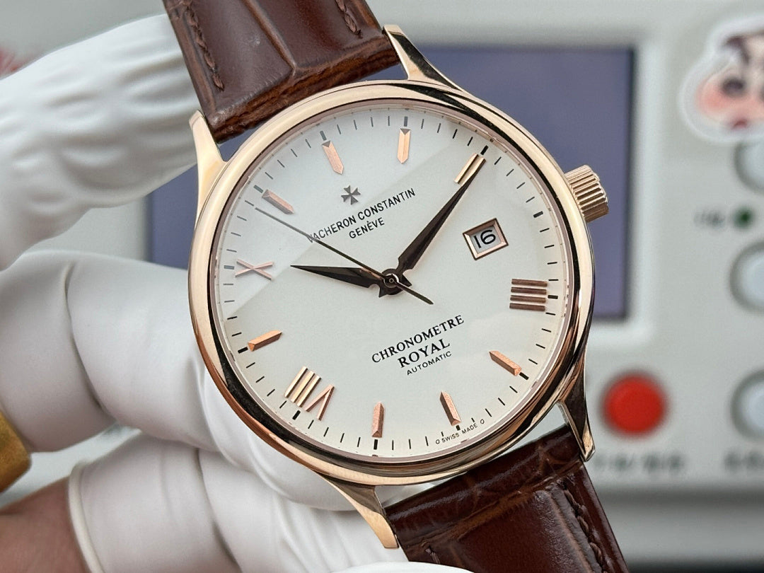Vacheron Constantin wristwatch close-up with white dial, brown leather strap, gold-tone bezel