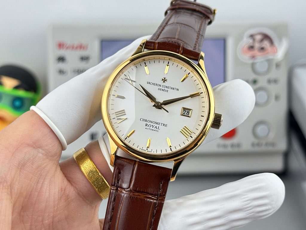 Vacheron Constantin watch on hand, brown leather strap, gold case, white dial, date window