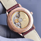 Vacheron Constantin watch back, rose-gold case with visible mechanical movement under glass.