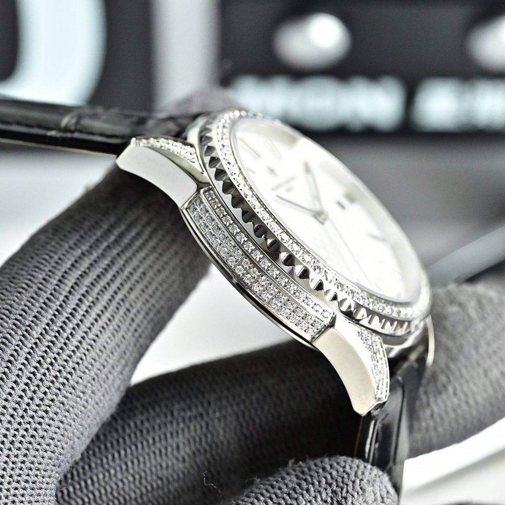 Vacheron Constantin watch with diamond-studded silver case and black leather strap.