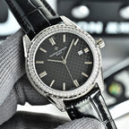 Vacheron Constantin watch with diamond bezel, dark textured dial, and black leather strap.