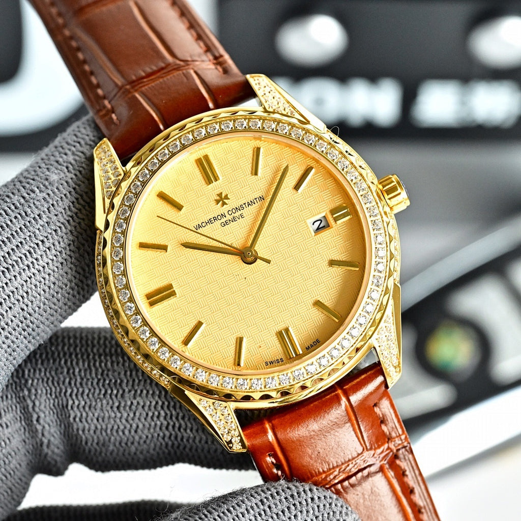 Vacheron Constantin watch with gold bezel, yellow dial, and brown leather strap.