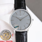 Vacheron Constantin wristwatch with gray dial and black leather strap, front view on cushion.