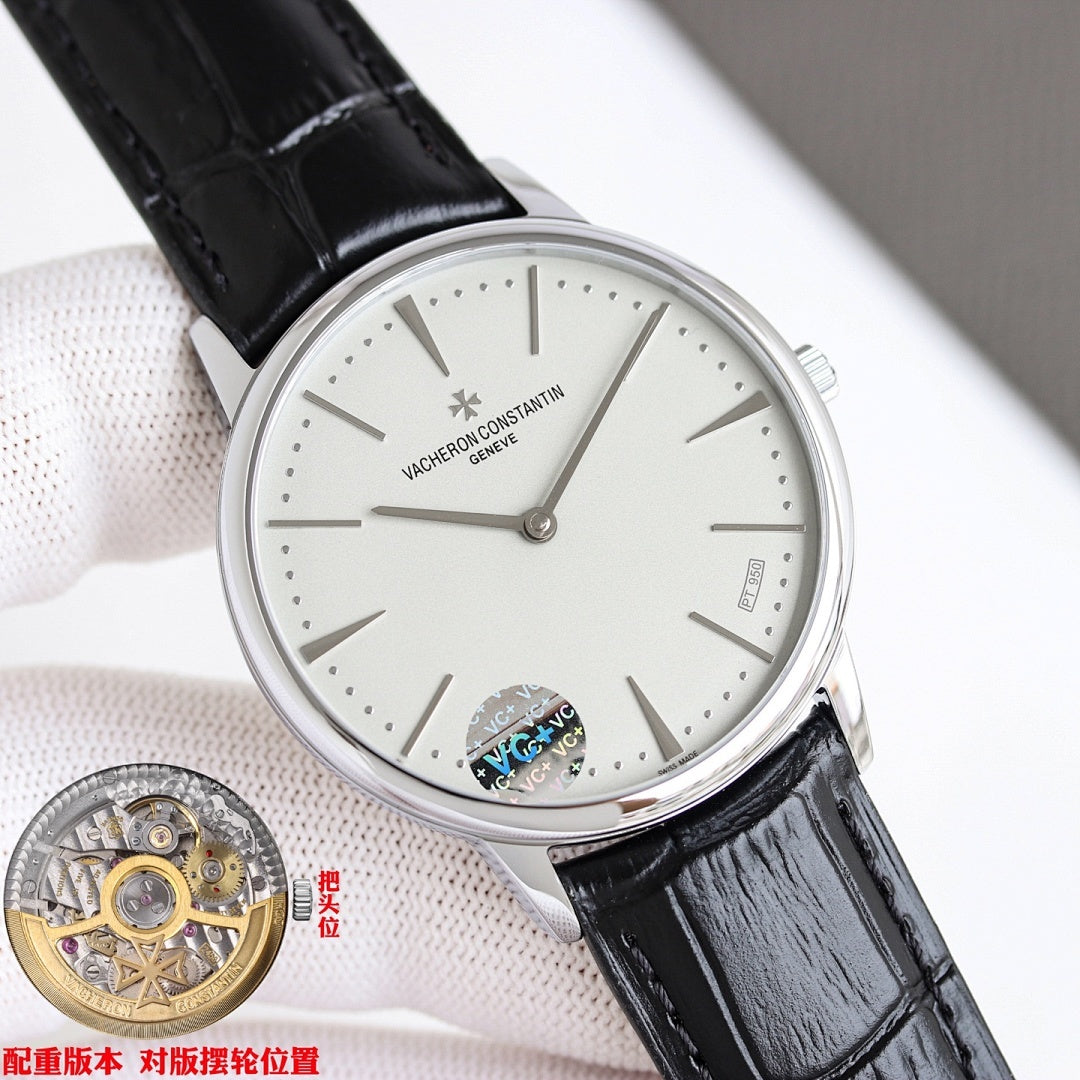 Luxury wristwatch with white dial and black leather strap, silver case and hour markers.