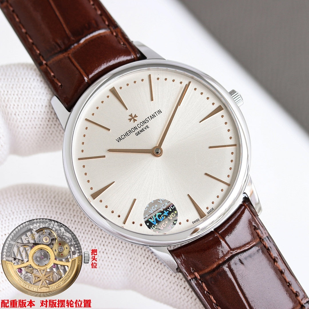 Luxury wristwatch with white dial and brown leather strap, silver case and hour markers.