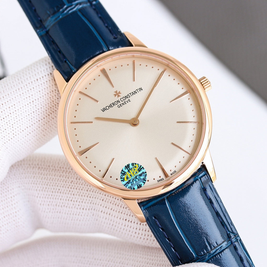 Vacheron Constantin wristwatch, rose gold case, white dial, blue leather strap