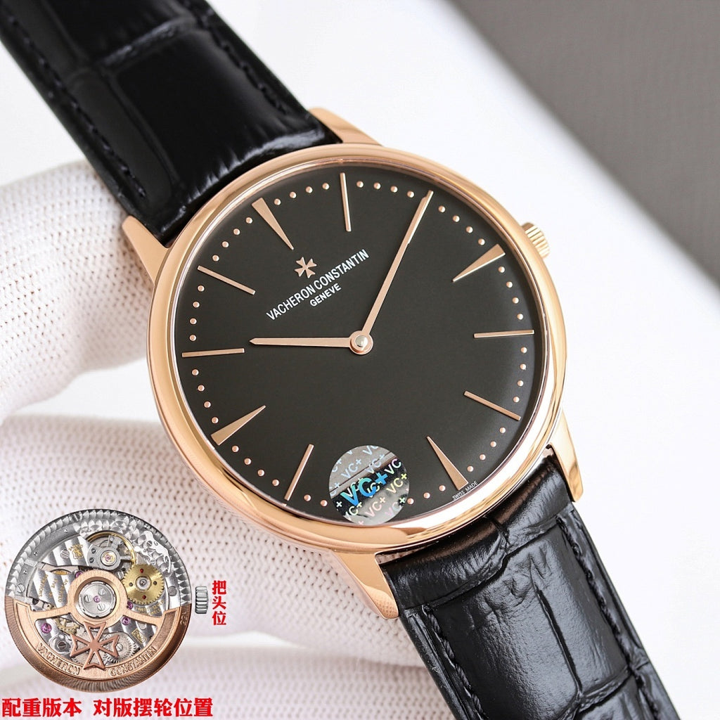 Black-dial watch with black leather strap and rose-gold case, crown detail at right