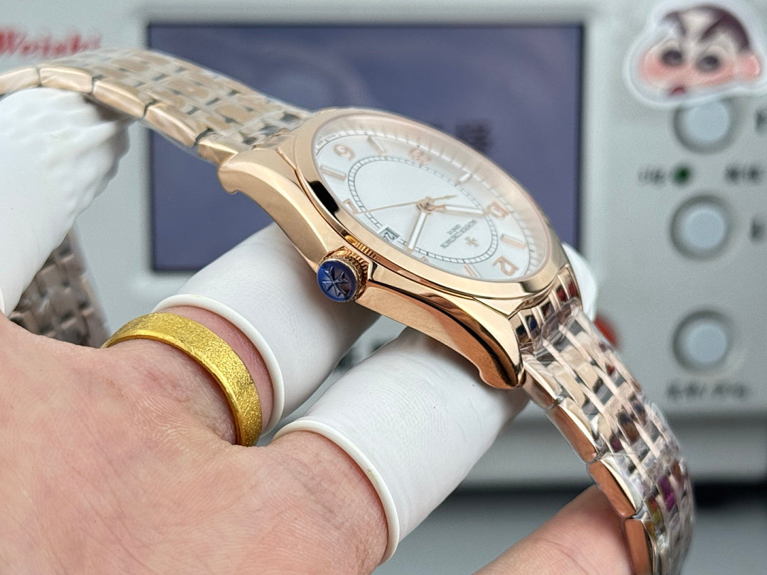 Vacheron Constantin wristwatch with gold-tone case and light dial, side angle view.