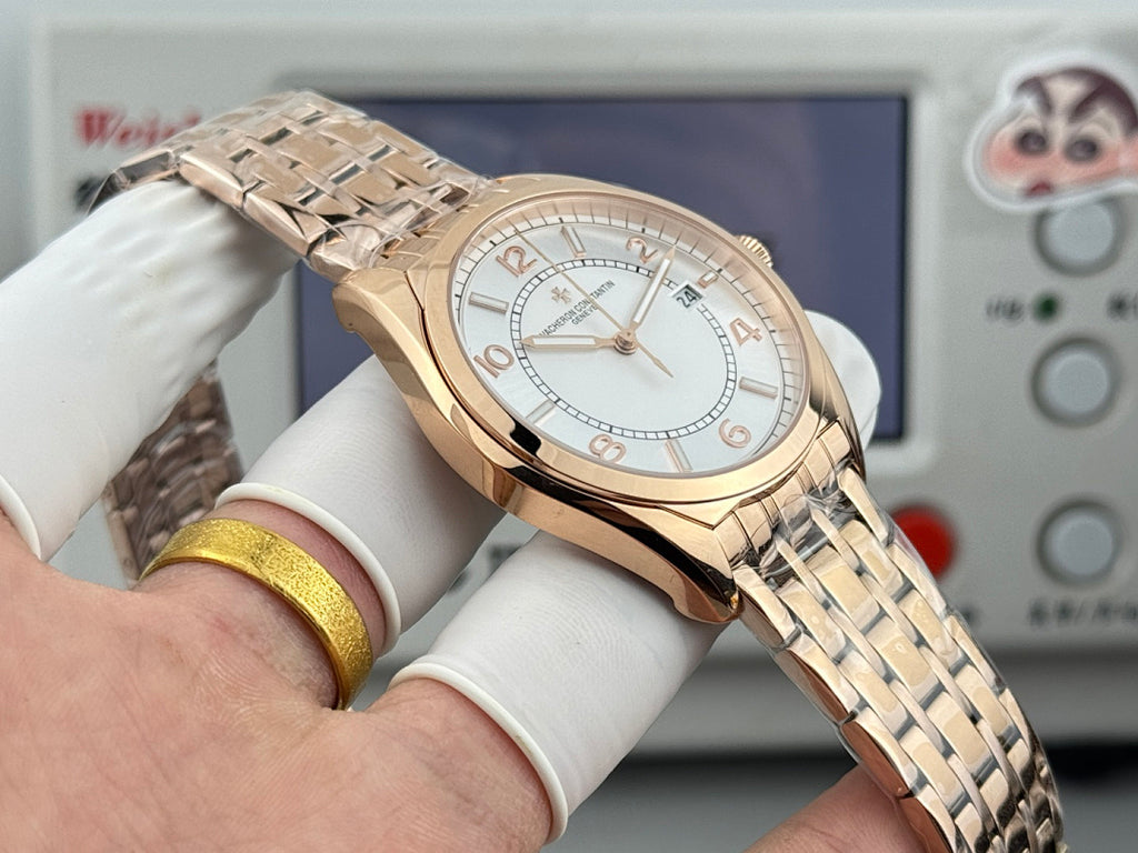 Vacheron Constantin wristwatch with gold-tone metal bracelet and light dial, angled front view.