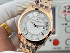 Vacheron Constantin wristwatch close-up with gold-tone case, light dial, date window.