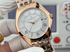 Vacheron Constantin wristwatch close-up, gold-tone case with light dial on metal bracelet.