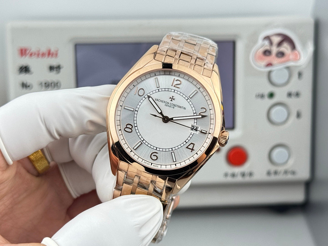 Vacheron Constantin wristwatch with gold-tone metal bracelet and light dial, front three-quarter view.