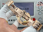 Vacheron Constantin wristwatch with gold-tone metal bracelet, side view showing clasp.