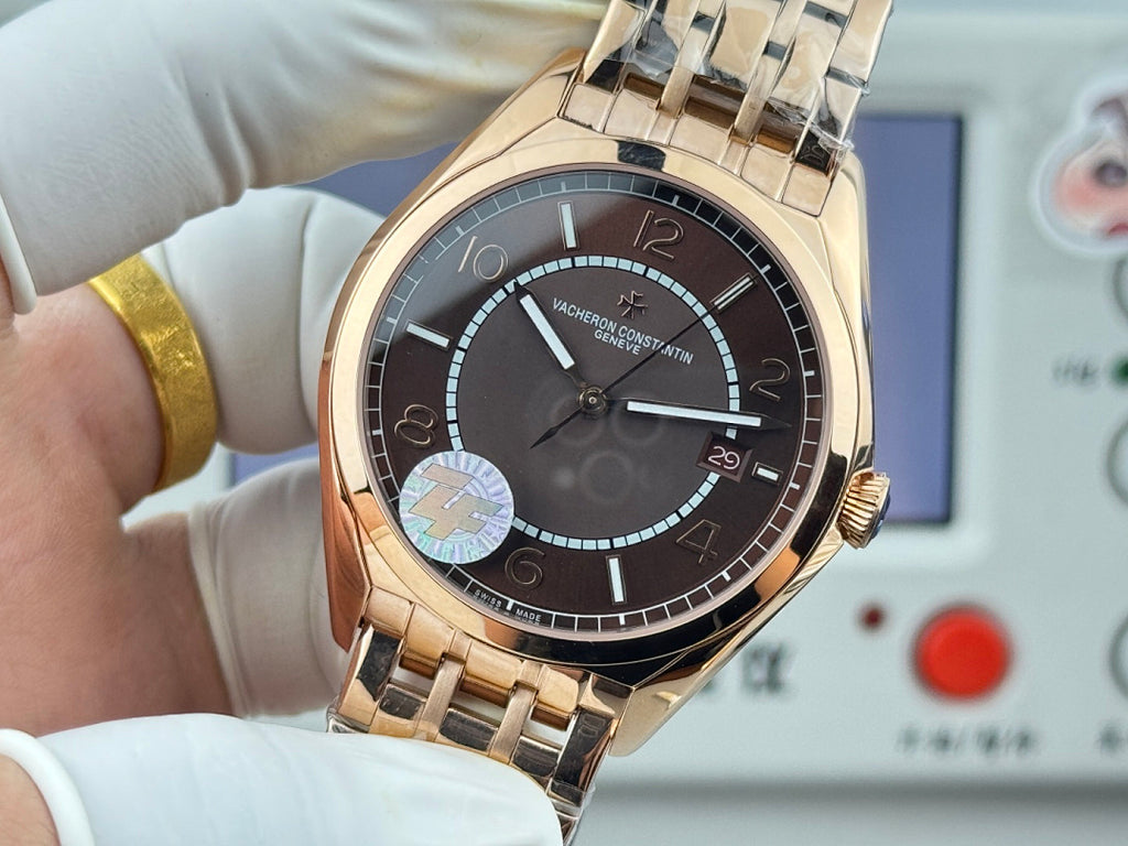 Vacheron Constantin gold-tone wristwatch with black dial, subdial and date display