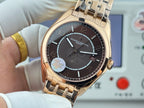 Vacheron Constantin gold-tone wristwatch with black dial, subdial and date display