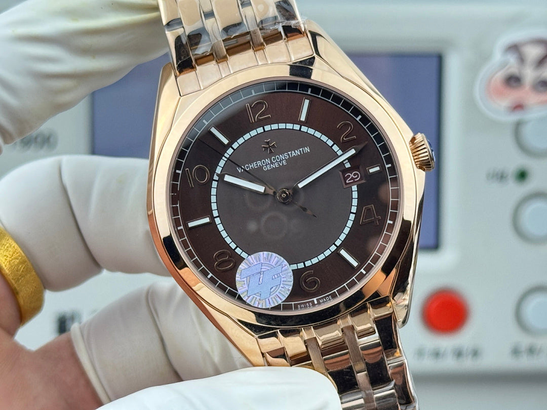 Vacheron Constantin gold-tone wristwatch close-up with black dial and subdial