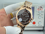 Vacheron Constantin gold-tone wristwatch front view with black dial and metal bracelet