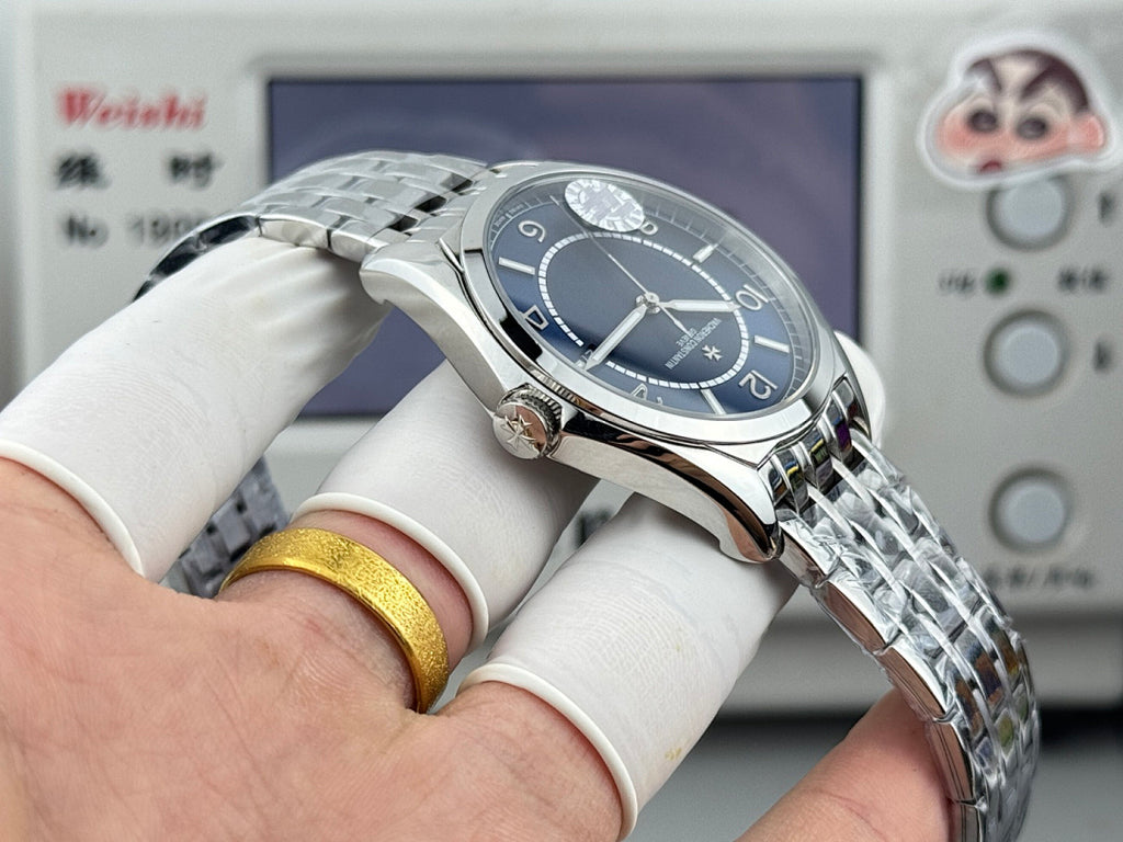 Vacheron Constantin wristwatch angled view, blue dial, stainless steel case and link bracelet