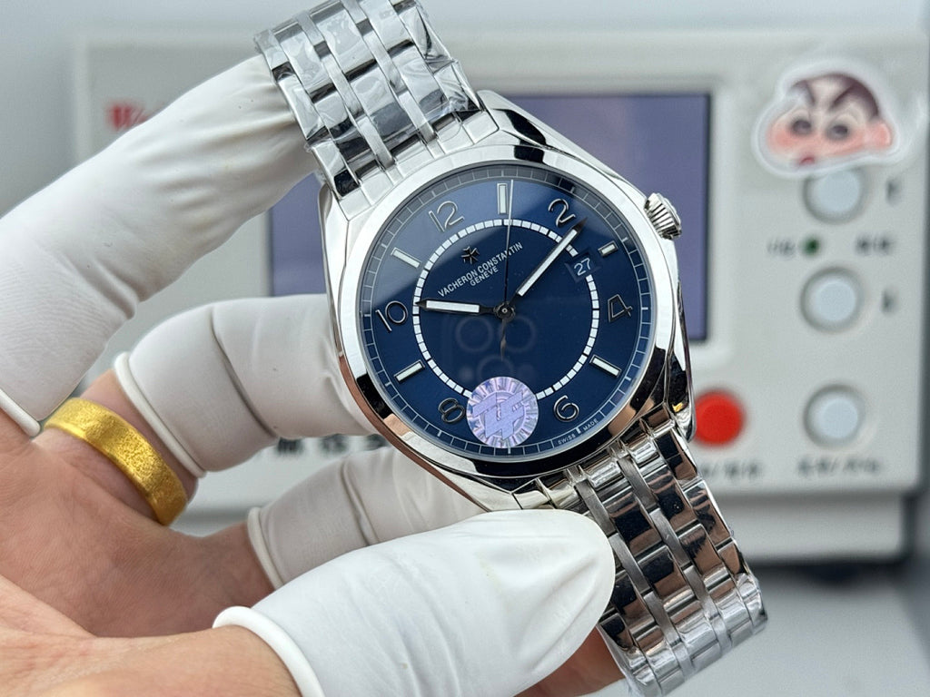 Vacheron Constantin wristwatch side view, blue dial with subdials and stainless steel bracelet