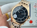 Gold-tone wristwatch with black dial and metal bracelet, front view