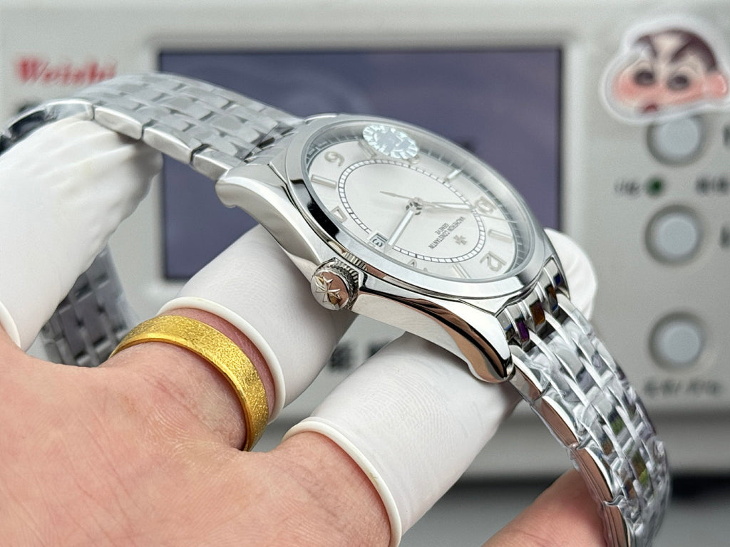 Vacheron Constantin wristwatch in silver tone with textured bracelet and rounded case
