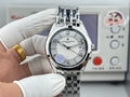 Vacheron Constantin wristwatch with silver dial and steel link bracelet