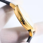 Gold watch case side profile with crown