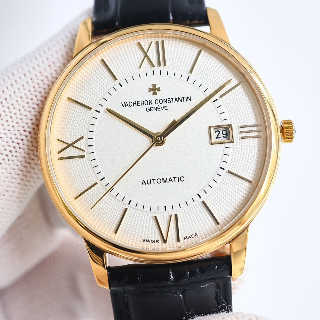 Automatic wristwatch with white textured dial, Roman numerals, date window, gold case, black strap