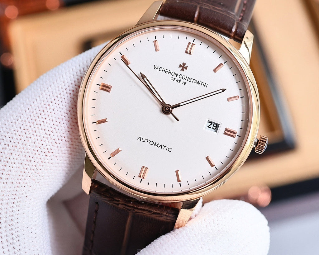 Automatic wristwatch angled view with rose-gold case, white dial, brown leather strap, date 29