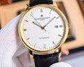 Automatic wristwatch with gold-tone case, white dial, black leather strap, date 18