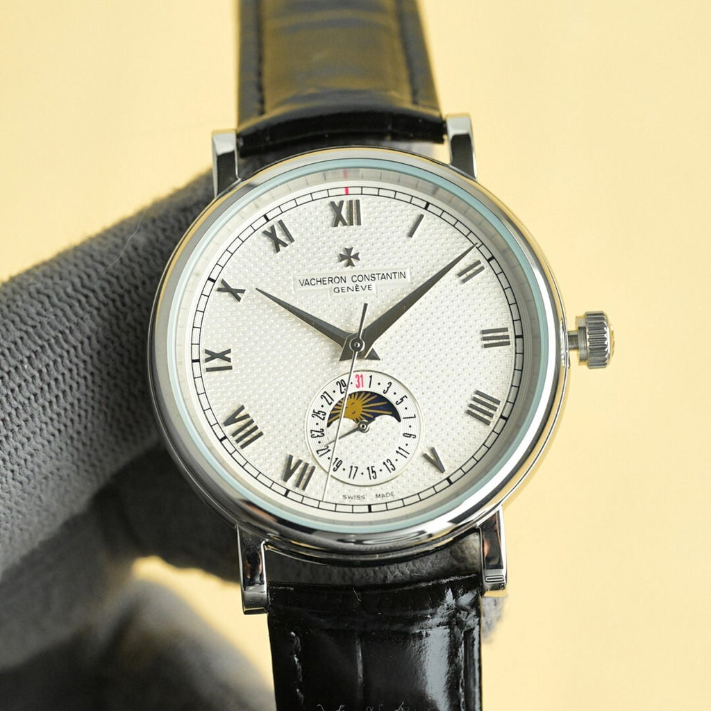 Vacheron Constantin watch with white dial, Roman numerals, black leather strap, subdial and markers