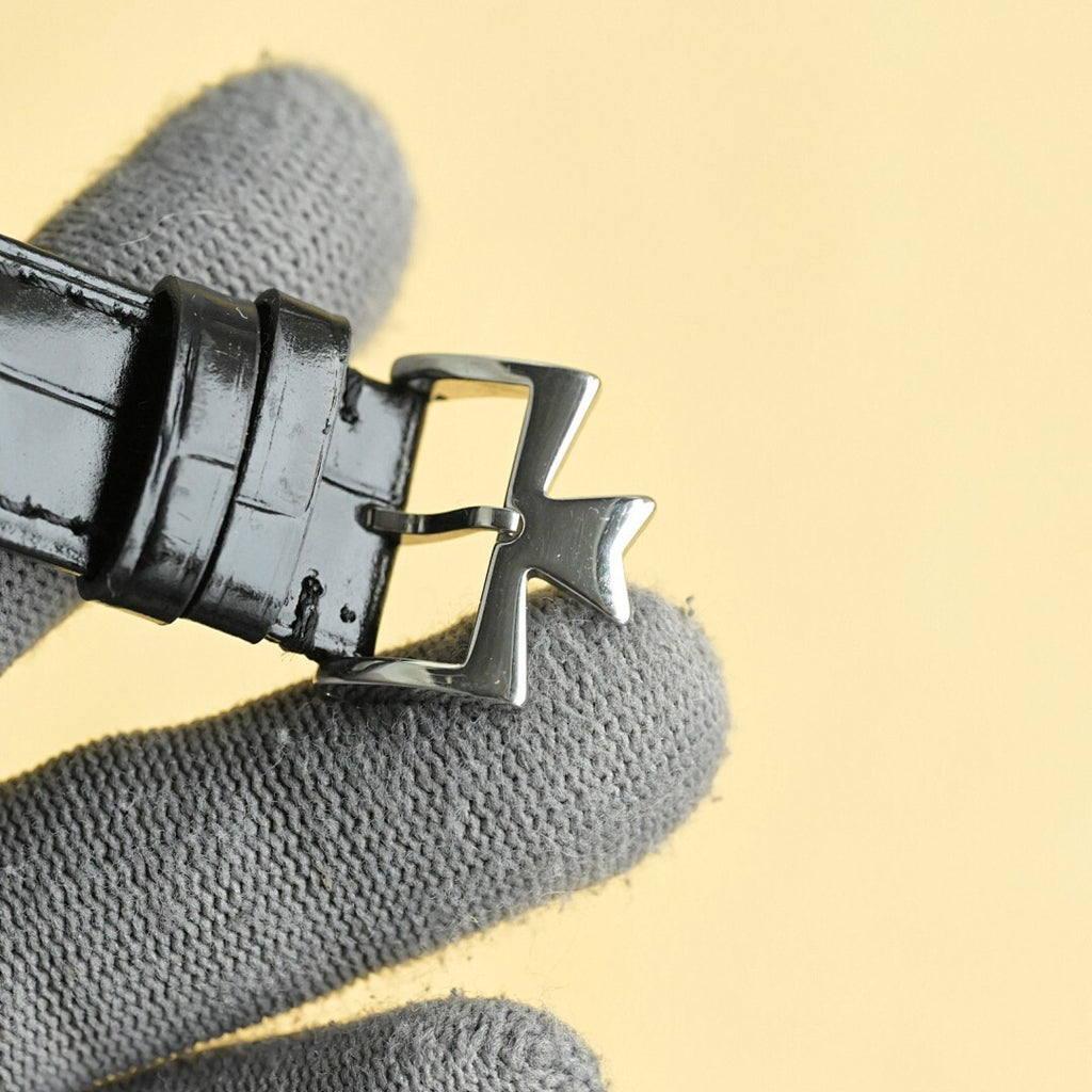 Vacheron Constantin watch buckle with black leather strap and polished metal clasp