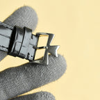 Vacheron Constantin watch buckle with black leather strap and polished metal clasp