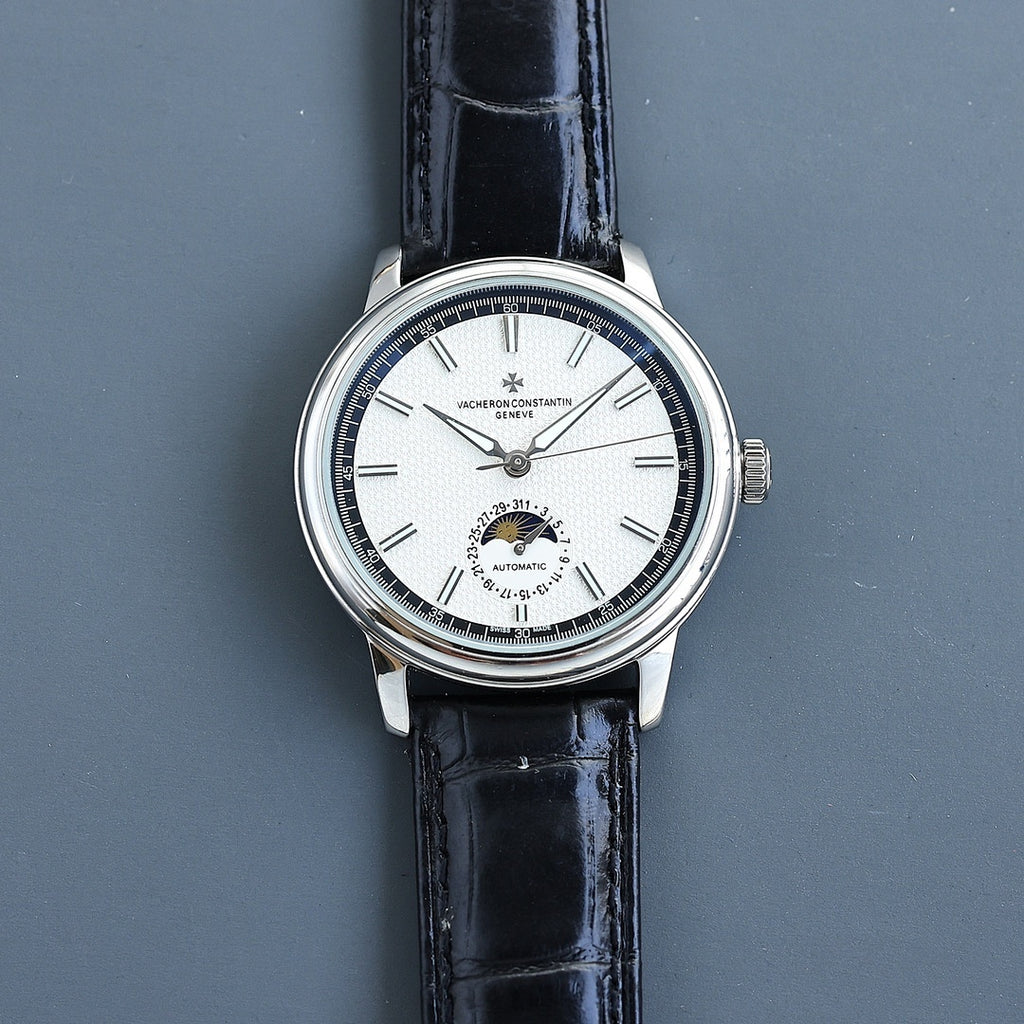 Vacheron Constantin watch: white dial, black leather strap, steel case