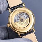 Vacheron Constantin watch case back with exposed movement, black leather strap