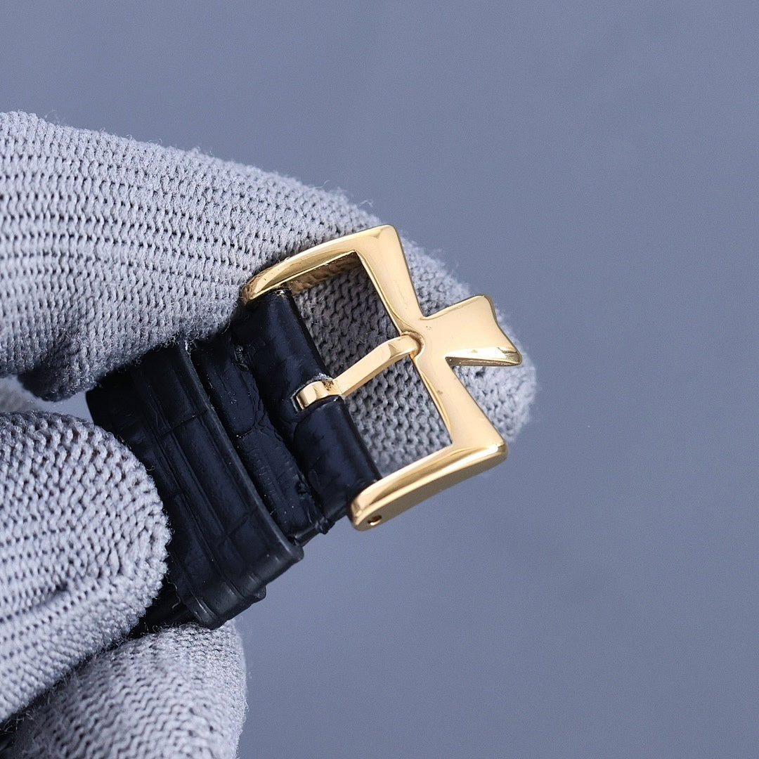 Vacheron Constantin watch buckle and strap in dark leather, gold-tone clasp