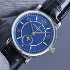 Vacheron Constantin wristwatch with blue dial, silver markers, and black leather strap