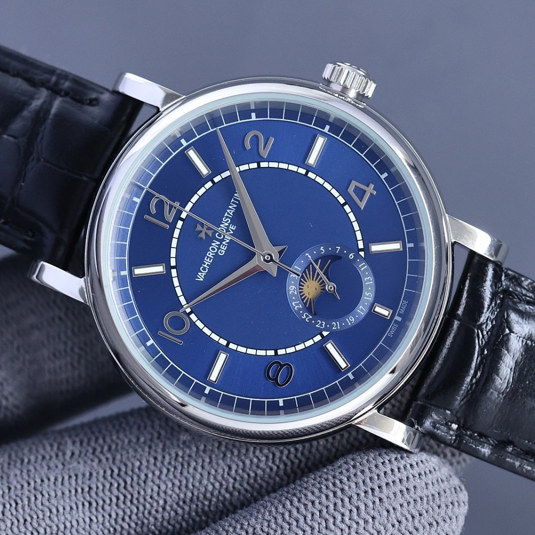 Vacheron Constantin wristwatch with blue dial, moonphase subdial, and black leather strap